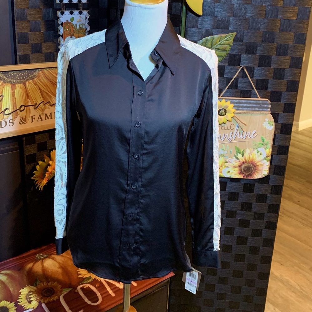 Women’s black with lace button down blouse.